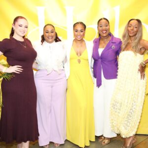 5 Cable Bahamas Staff in formal wear posing