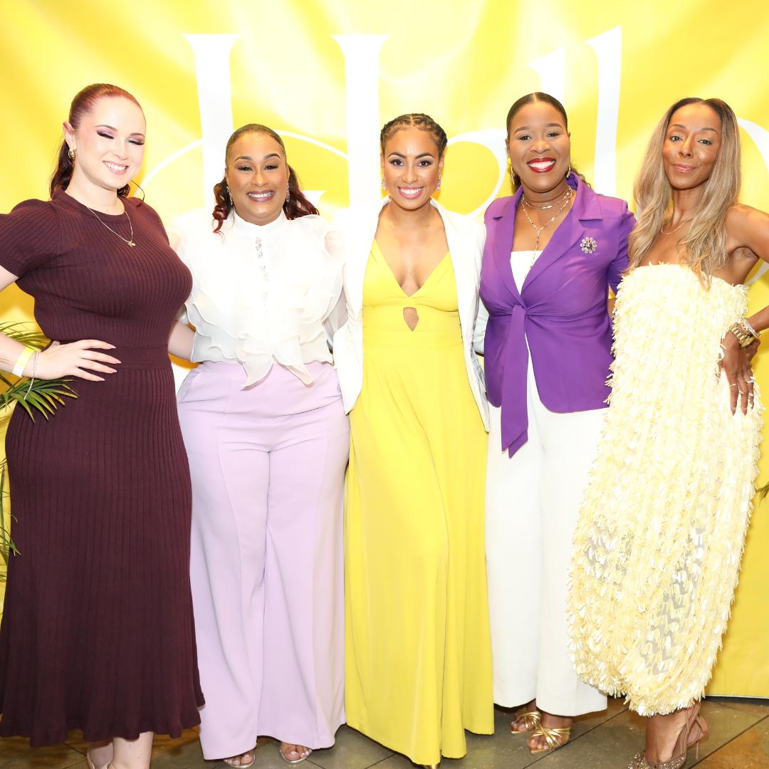 5 Cable Bahamas Staff in formal wear posing